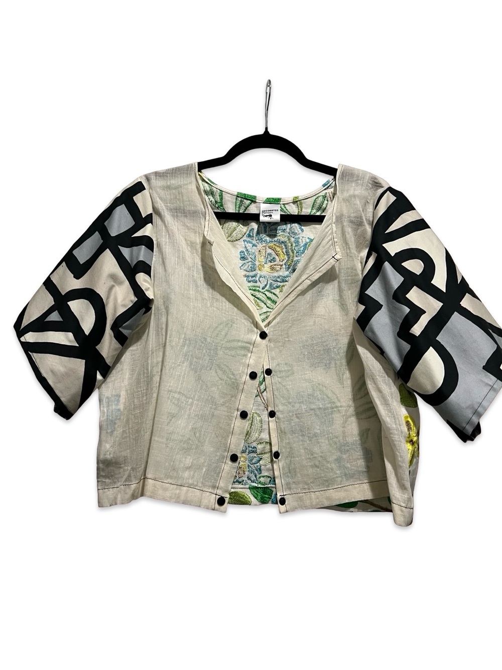 Lightweight Beige Button-Front Top with Graphic Black Sleeve Detail